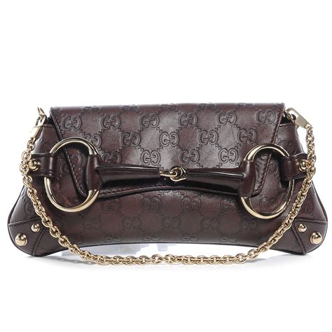 Gucci guccissima clutch